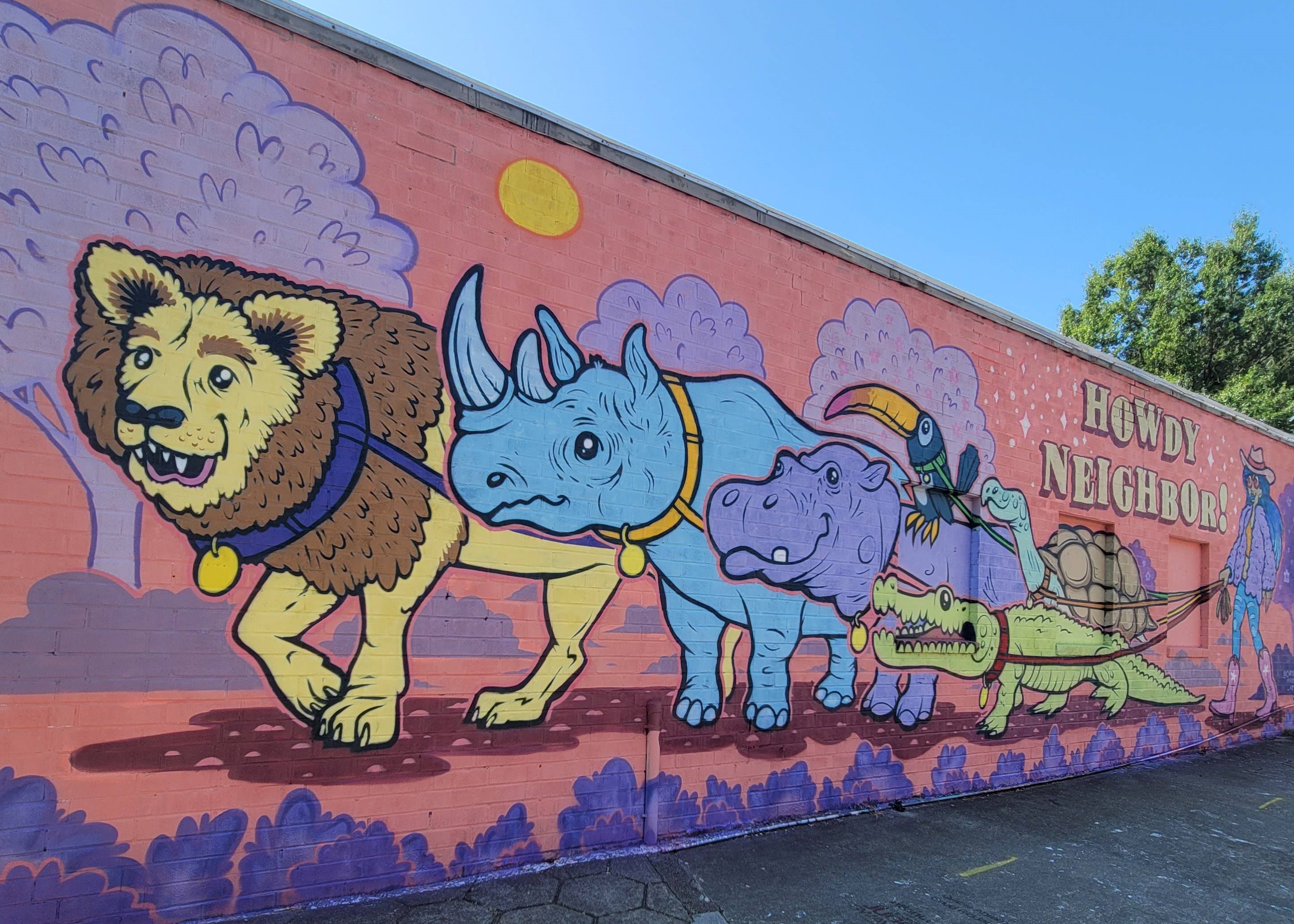 Animal mural on a brick wall